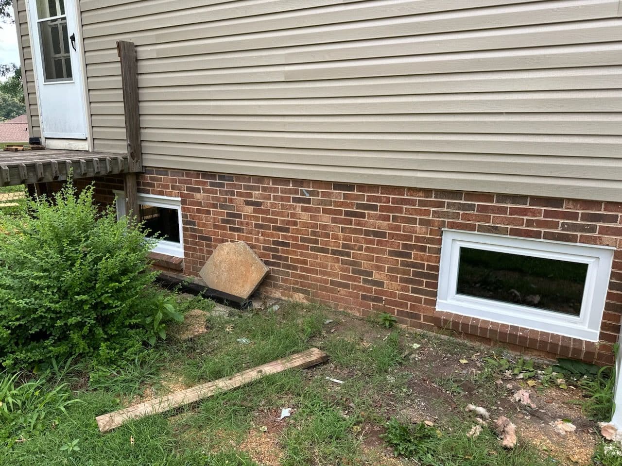 Gallery photos for Wood Windows Swapped for Low-Maintenance Vinyl on This Split-Level Home: Image #2