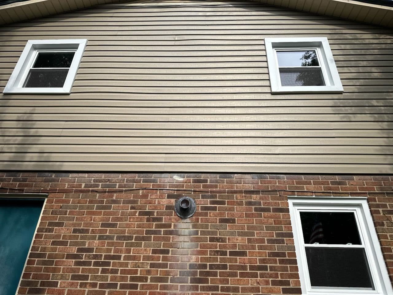 Gallery photos for Wood Windows Swapped for Low-Maintenance Vinyl on This Split-Level Home: Image #3