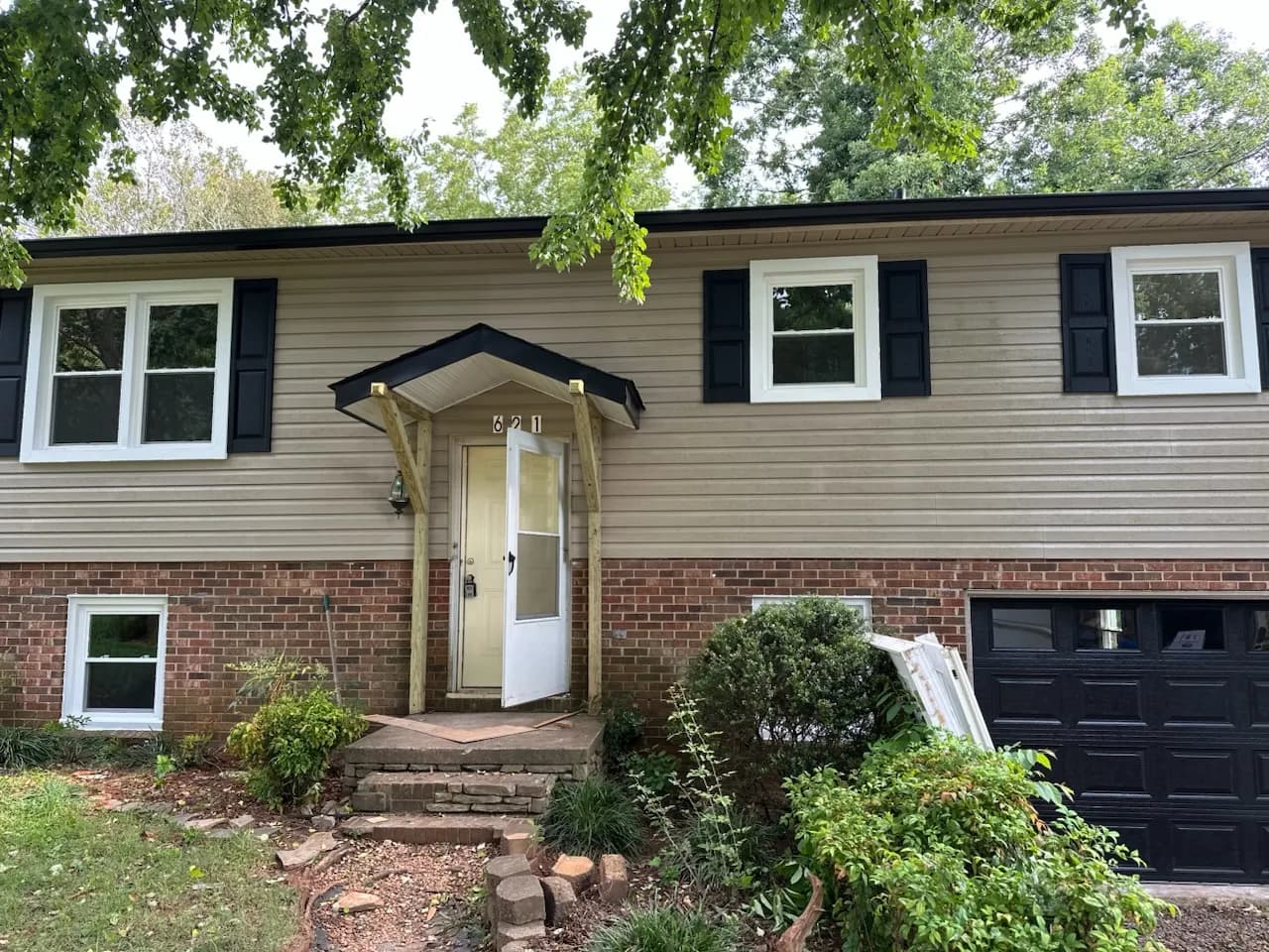 Project Wood Windows Swapped for Low-Maintenance Vinyl on This Split-Level Home image